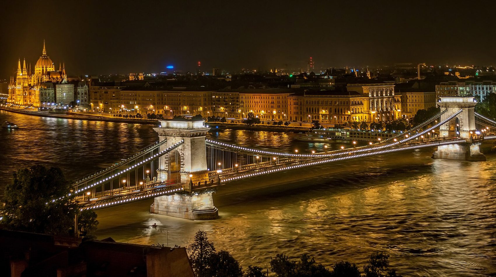 The Széchenyi Chain Bridge and Budapest illuminated at night
